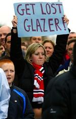 Manchester Uniteds fans er utilfredse med den nye 'klub-ejer' Malcolm Glazer, som de mener bruger klubben som et stykke legetøj. - Arkivfoto: AP 