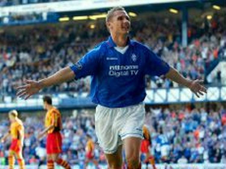 Danske Peter Løvenkrands jubler efter en scoring for Rangers. - Arkivfoto: AP 