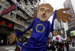 Demonstranter i Hongkongs gader protesterer mod de rige landes manglende mod på at åbne for handelen med de fattigere nationer ved WTO-topmødet. - Foto: AP 