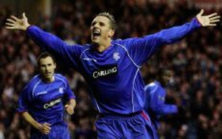 Peter Løvenkrands er glad efter scoringen mod Hearts - den hurtige dansker er inde i stime af scoringer for Rangers. - Foto: AP 