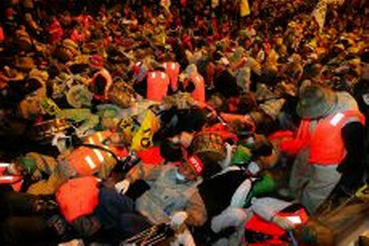 WTO-modstandere lægger sig ned på gaden i protest i forbindelse med topmødet i Hongkon 