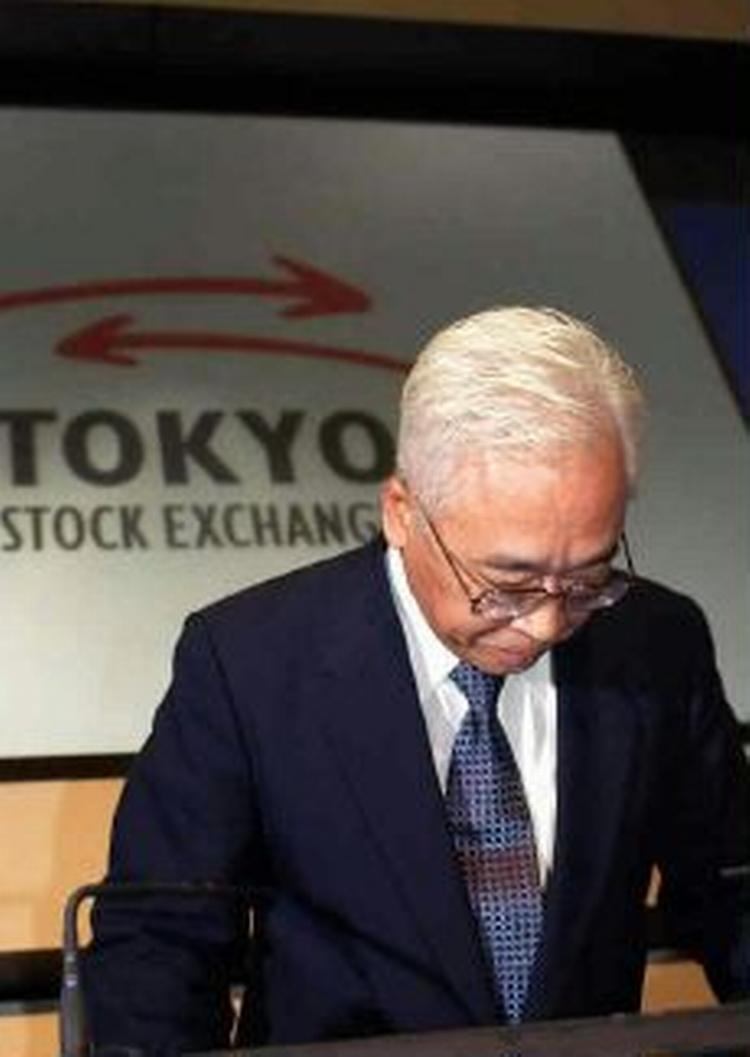 Chefen for Børsen i Tokyo, Takuo Tsurushima, er trådt tilbage, efter at have kostet en kunde to milliarder kroner - Foto: AP 
