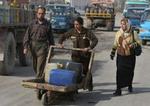 De foreløbige valgresultater i Bagdad overrasker de fleste eksperter. Sunnimuslimerne kræver nu omvalg i hovedstadsområdet. - Foto: AP 
