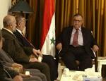 Iraks præsident, Jalal Talabani (th.), mødtes med repræsentanter fra oppositionen. - Foto: AP 