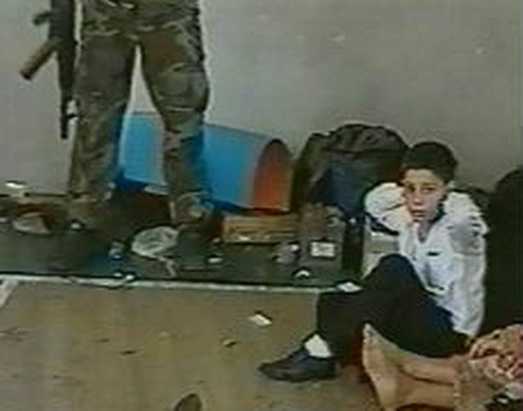 330 mennesker - heraf 186 børn - mistede livet ved tragedien. - Arkivfoto: AP 