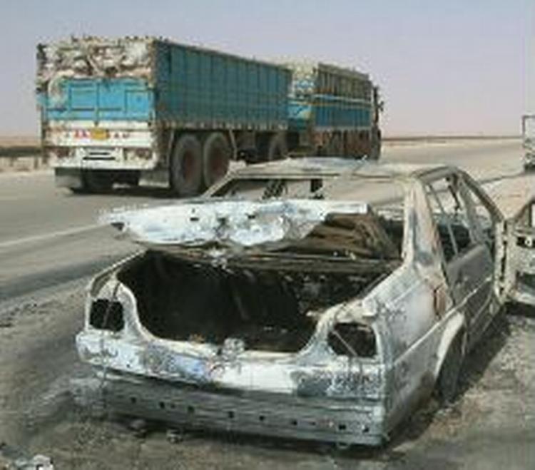 En lastbil med amerikanske varer på vej til Bagdad. - Arkivfoto: AP 