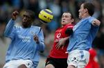 Wayne Rooney og Manchester United blev de små i kampen mod rivalerne fra Manchester City. City vandt fortjent 3-1. - Foto: APA! 