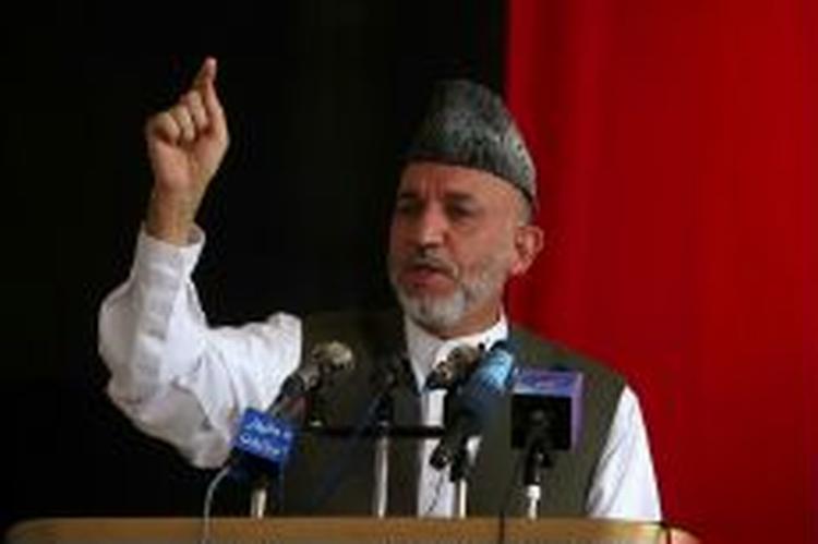 Den afghanske præsident Hamid Karzai har været central for forsøget på at indføre demokrati i landet. Han kommer nu på besøg i Danmark. - Arkivfoto: AP 