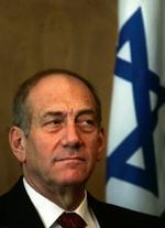 »Vi kan ikke tillade, at nogle (lande) med irrationelle hensigter besidder atomvåben«, siger Ehud Olmert. - Foto: AP 