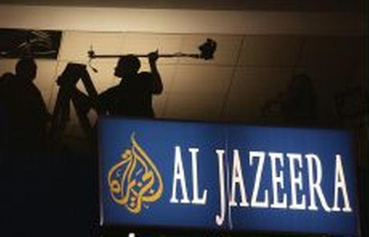 Den arabiske tv-station al-Jazeera er på vej til at oprette et nyhedsbureau i Zimbabwe. - Arkivfoto: AP 