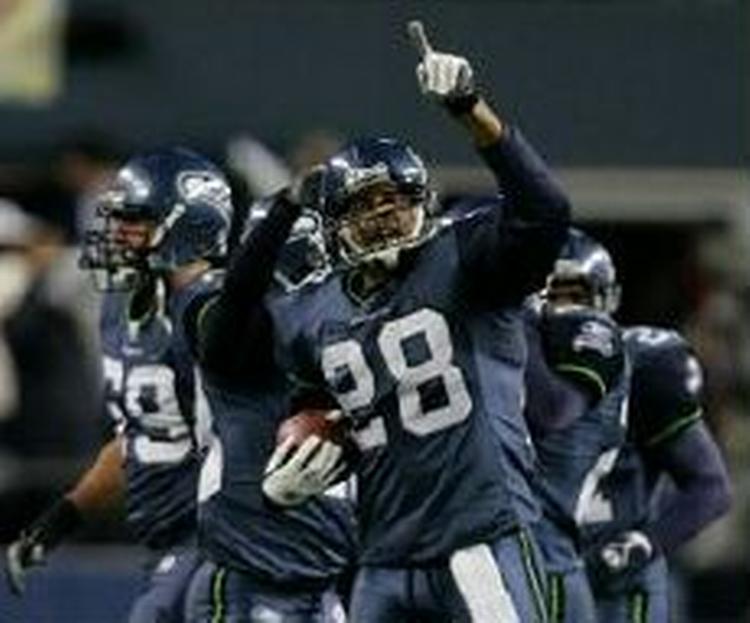 Seattle Seahawks-spillere fejrer sejren. - Foto: AP 