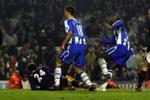 Wigans Jason Roberts (th) scorer det altafgørende mål i slutsekunderne og sender Arsenal ud i mørket. - Foto: AP 