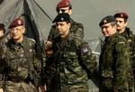 Den internationale styrke i Afghanistan skal udvides. Men beslutningen om den danske styrkes forøgelse er udskudt. - Arkivfoto: AP 