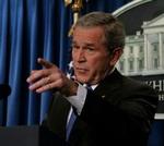 Bush under sin tale i Det Hvide Hus. - Foto: AP 