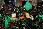 Hamas-tilhængere fester efter valgsejren. Israel vil ikke forhandle. - Foto: AP 