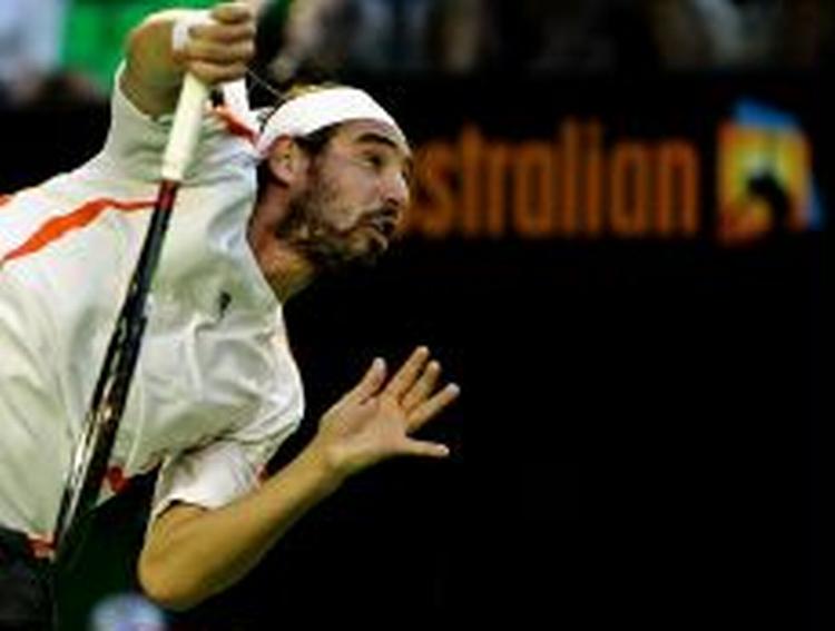 Marcos Baghdatis kom godt i gang mod Federer i Melbourne. - Foto: AP 