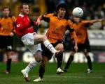 Wayne Rooney og Wolverhamptons Ki-Hyeon Seol. - Foto: AP. 
