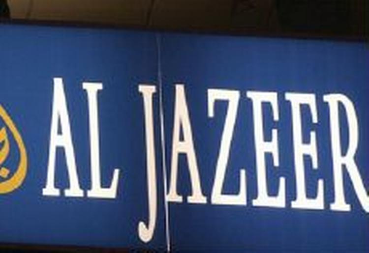Den arabiske tv-kanal Al Jazeera har interviewet Jyllands-Postens kulturedaktør live. - Foto: AP 