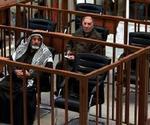 Saddam Husseins stol i retssalen var tom i dag. - Foto: AP 