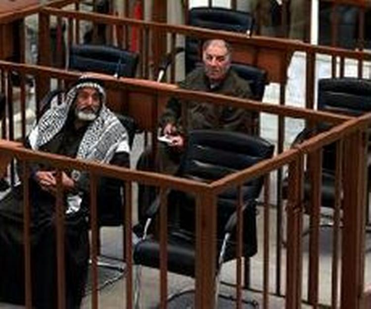 Saddam Husseins stol i retssalen var tom i dag. - Foto: AP 