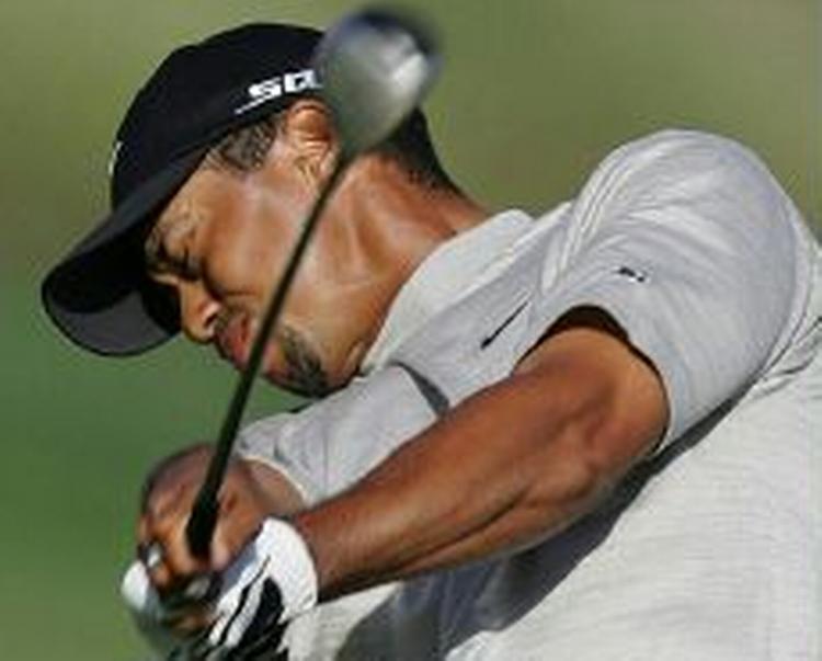 Tiger Woods kunne ikke slå sig forbi Anders og Søren Hansen. - Foto: AP 