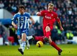 Liverpools Sami Hyypiä scorer kampens eneste mål mod Wigan. - Foto: AP 