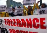 Indonesiske demonstranter opfordrer til tolerance over for profeten i en protest mod Danmark. I dag har 7.800 virksomheder i Indonesien besluttet at boykotte danske varer. - Foto: AP 