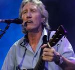 »Er I der, Roskilde?« Roger Waters spiller på årets Roskilde Festival. Her ses han til sidste sommers Live 8-koncert i Hyde Park, London. - Foto: AP 