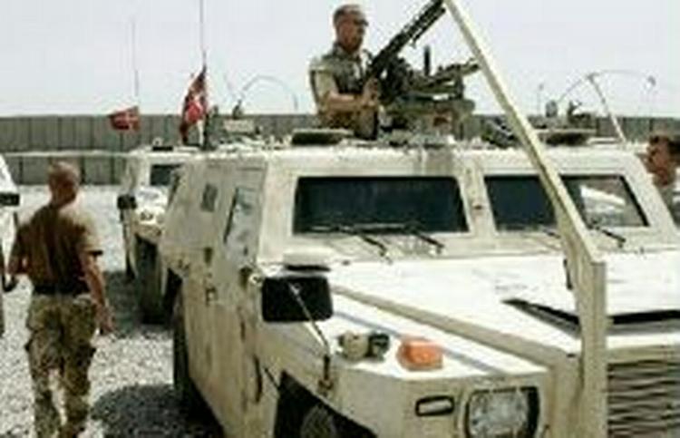 Irak afviser at de danske soldater skal ud af landet. Tværtimod siger myndighederne nu, at soldaterne helst skal blive - Thomas Borberg 