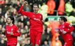 Peter Crouch knytter næven efter sin scoring. - Foto: AP 
