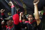 »Danmark er denne verdens ondskab«, lyder det fra demonstranter i Indonesien i dag. - Foto: AP 