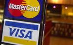 Indehavere af et Visakort eller et Mastercard skal være varsomme med at svare på forespørgsler om kortoplysninger via mail. - Arkivfoto: AP 