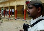Efter en blodig dag i Varanasi i Indien er politiet i højeste beredskab. - Foto: AP 