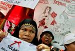 Indonesiens regering vil indføre anti-pornolove, som forbyder kys på åben gade og nøgne skuldre - Foto: AP 