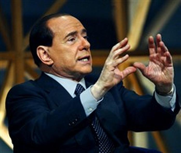 De to statsadvokater fra anklagemyndigheden i Milano forventes om ganske få dage eller højst uger at rejse formel tiltale mod Berlusconi og Mills. - Foto: AP 