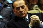 Italiens premierminister Silvio Berlusconi er kommet under nyt pres fra korruptionsanklager midt under valgkampen. - Arkivfoto: AP 