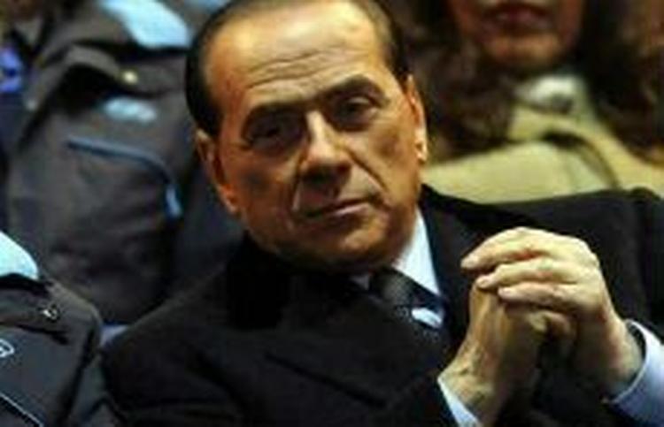 Italiens premierminister Silvio Berlusconi er kommet under nyt pres fra korruptionsanklager midt under valgkampen. - Arkivfoto: AP 