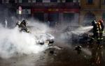 42 demonstranter blev anholdt under tumulterne i Milano. - Foto: AP 