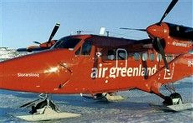 HJULSKI. Twin Otter, som kan lande på både snedækket og snefri overfalde. - Foto: Jeppe Handwerk 