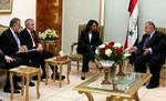 Jack Straw (nr. to fra venstre) og Condoleezza Rica mødes med Jaafari i Bagdad. - Foto: AP 
