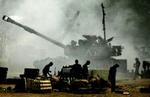 Israelske soldater forbereder ert angreb mod Gaza. - Foto: AP 