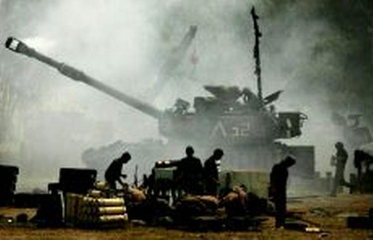 Israelske soldater forbereder ert angreb mod Gaza. - Foto: AP 