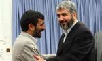 Irans præsident Mahmoud Ahmadinejad udveksler håndtryl med Hamas-lederen Ismail Haniya . - Foto: AP 