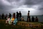 Muslimsk familie på søndagsudflugt i Mumbai. Det regerende Kongresparti har foreslået at indføre kvoteordninger for det muslimske mindretal på arbejdsmarkedet og universiteterne.   Foto: Manish Swarup/AP 