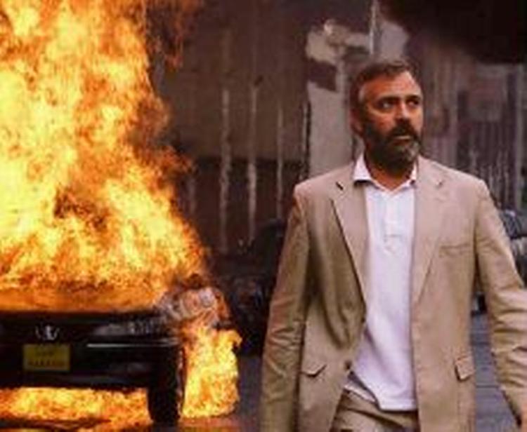George Clooney har instrueret og spiller selv en mindre rolle i filmen 'Syriana'. Filmen skal vises i de Forenede Arabiske Emirater - men ikke i sin fulde form. - Foto: AP 