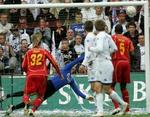 FC Nordsjællands Joseph Kamwendo (ikke med på billedet) hamrer bolden i mål, mens FC Københavns keeper Jesper Christiansen strækker sig forgæves. - Foto: Lars Poulsen 
