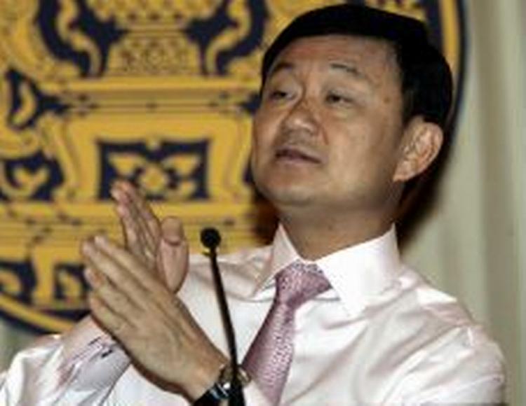 Thaksin Shinawatra overvejer at genopstille, hvis Thailands valg fra 2. april bliver annulleret. Den tidligere premierminister blev ellers presset ud af protester. - Arkivfoto: AP 