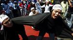 Demonstranter i Jakarta i Indonesien. - Foto: AP 