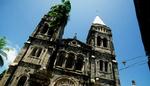 En præst fra Uganda er afsløret af en sporhund i simpelt tyveri. Billedet er af en katolsk kirke i Stone Town, Zanzibar, som er en del af Tanzania - Ugandas naboland. - Arkivfoto: AP 
