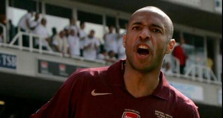 Thierry Henry scorede tre gange mod Wigan og cementerede dermed sin status som topscorer i Premier League. - Foto: AP. 
